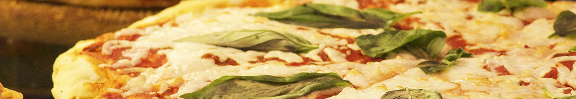 Eating Pizza Sandwich Vegan at Pisa Lisa restaurant in Sedona, AZ.